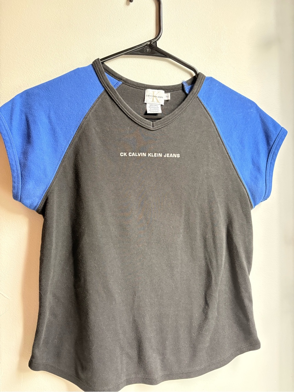 Calvin Klein Black Tee with Blue Raglan Sleeves